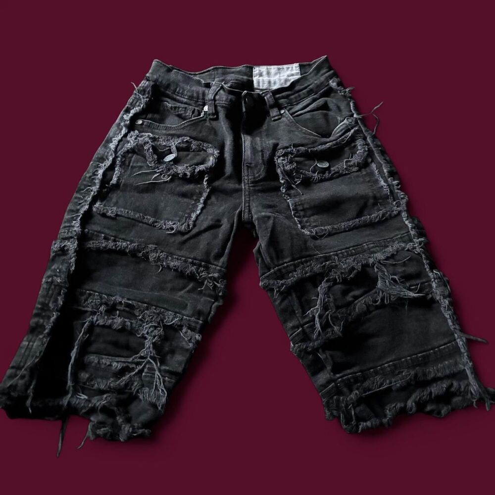 Evolution in style Boy’s Black Shorts size 12